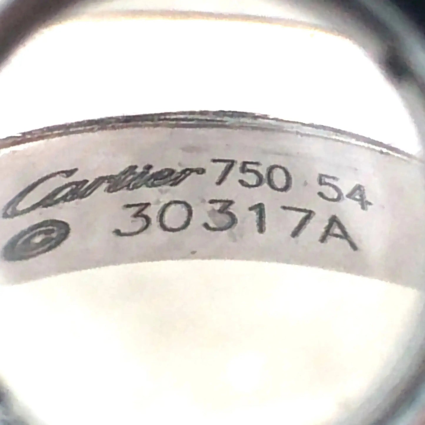 Cartier, 18K Gold Diamond Onyx 'Menotte' Crossover Ring Cartier